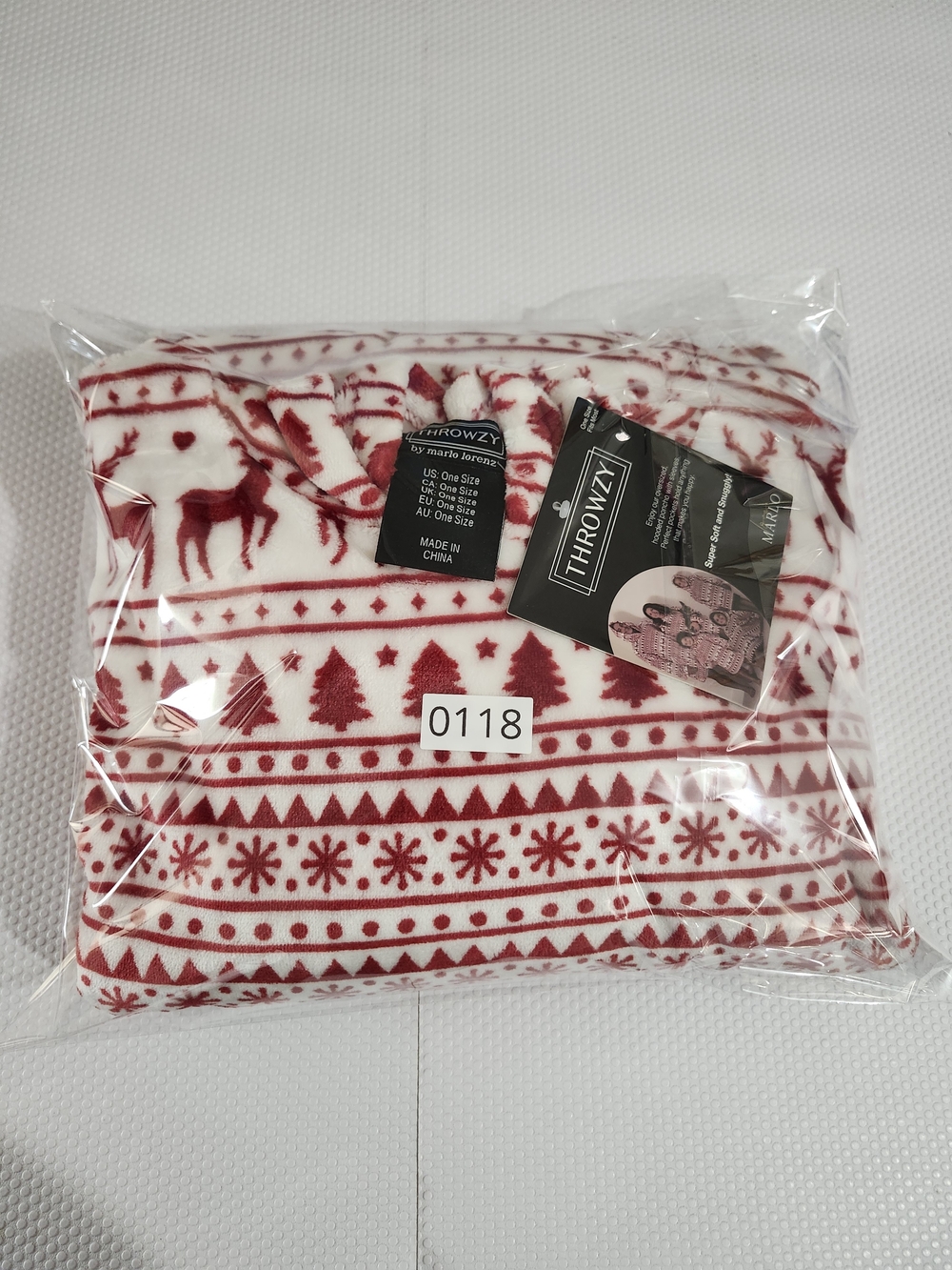 Throwzy wearable blanket hoodie features a red and white reindeer holiday patter - Picture 12 of 12